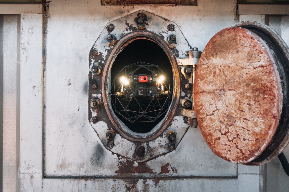 Scared to enter the sewer? Roll in the caged drone!